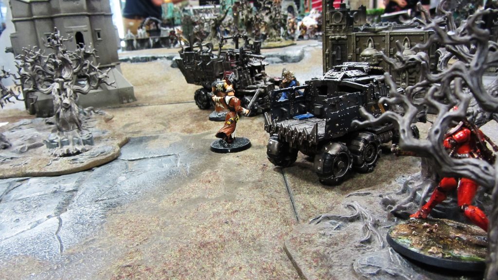 Lucretia uses the sandstorm to close with the target