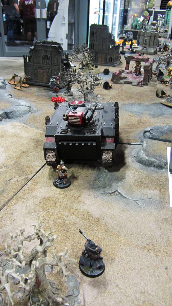 Korpik and Fetch use the Razorback as moving cover to advance