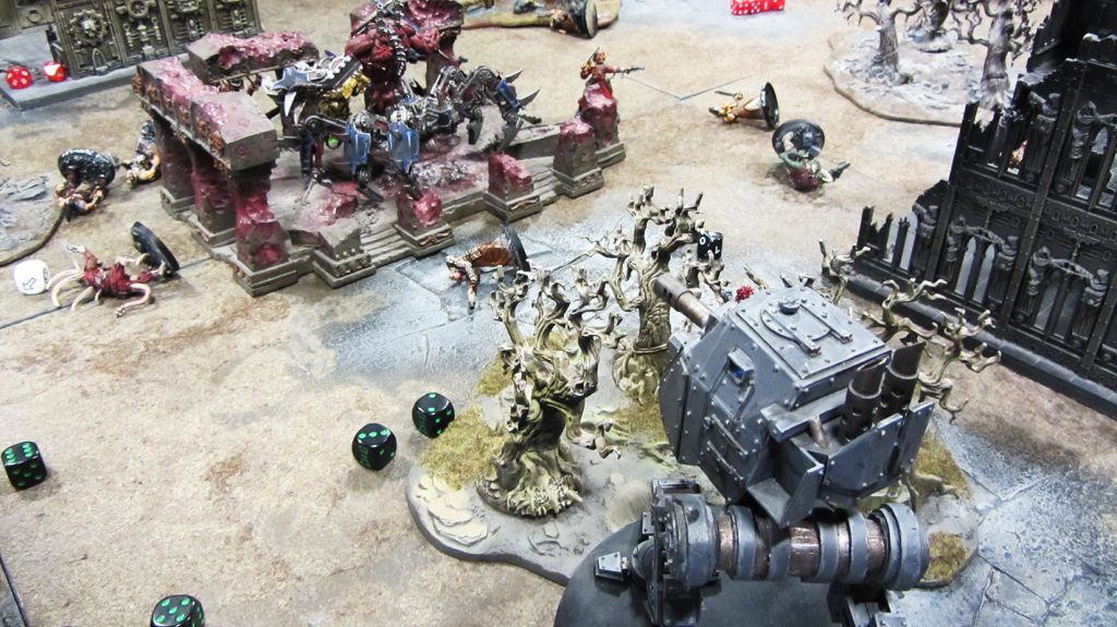 The sentinel pumps autocannon fire into the daemon engine to little effect