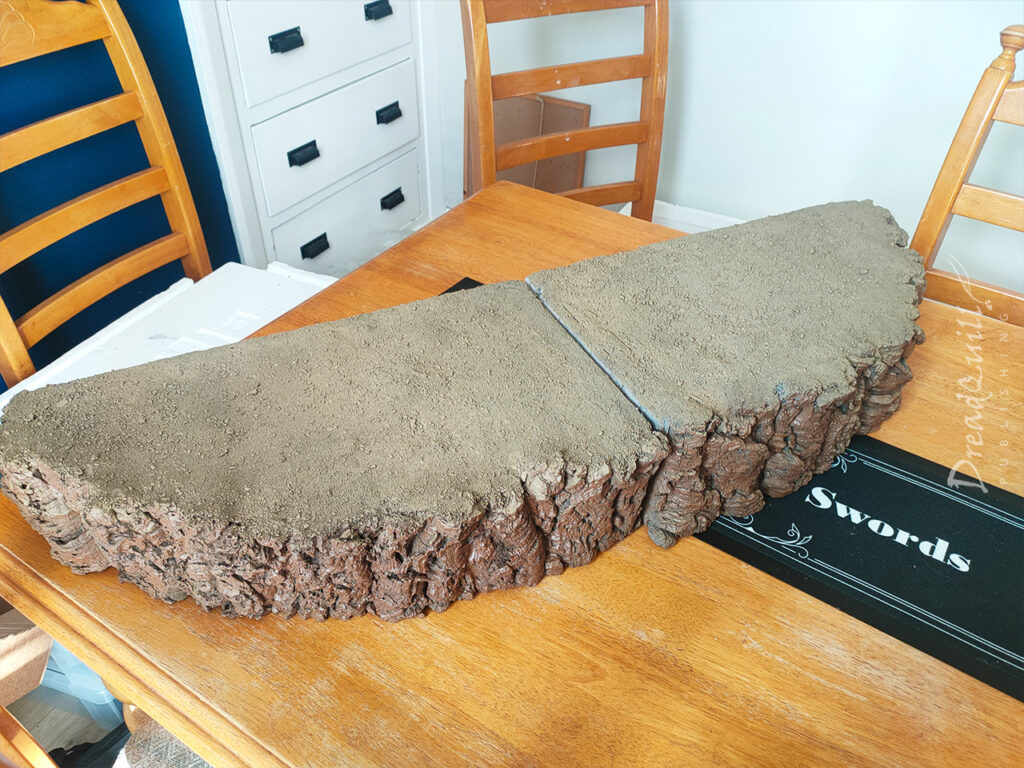 WIP ash waste modular hills undercoated sandy brown, showing how the tops of the hills don't line up correctly